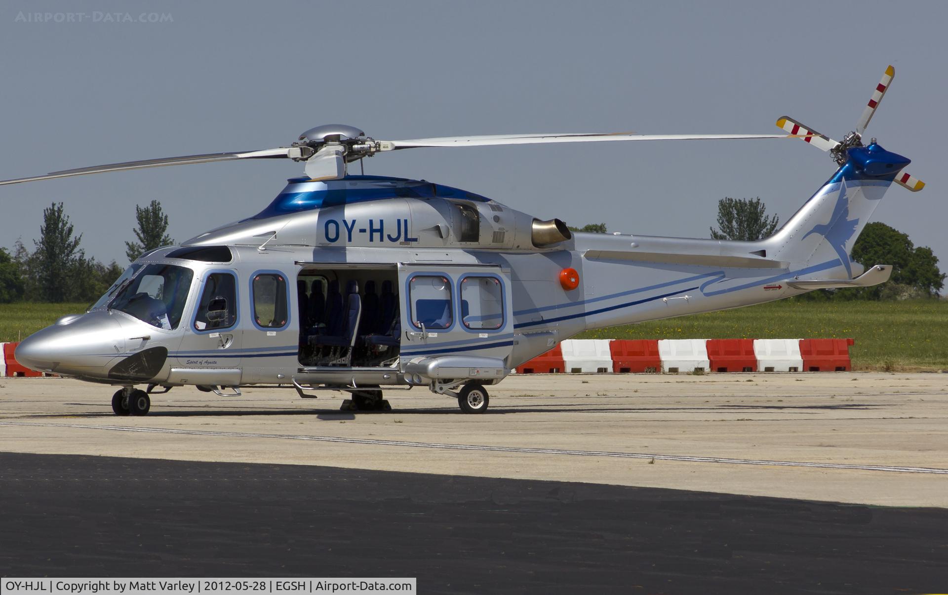 OY-HJL, 2009 AgustaWestland AW-139 C/N 31245, Sat on stand at Bond's in the afternoon sun.