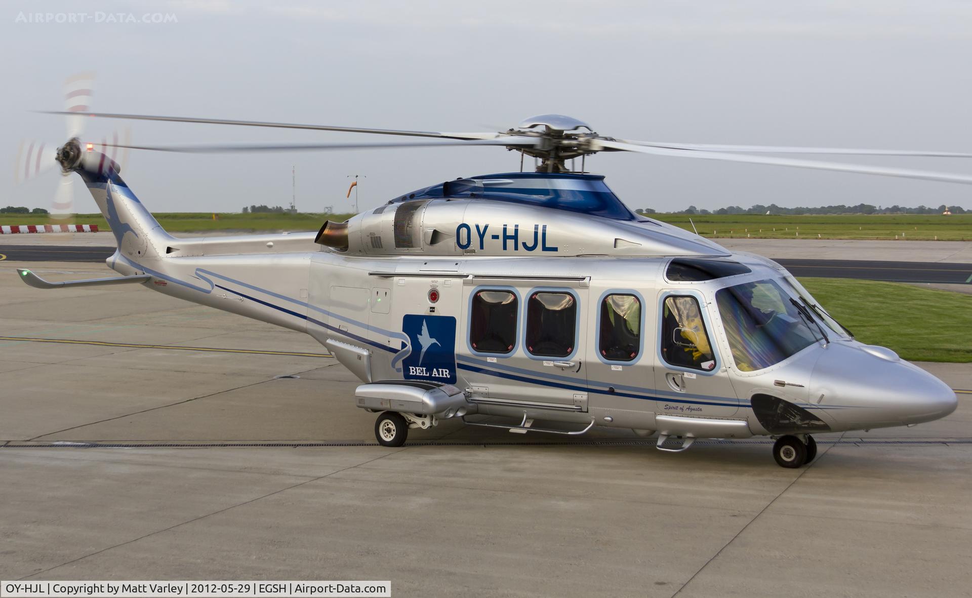 OY-HJL, 2009 AgustaWestland AW-139 C/N 31245, Arriving at Bonds Hangar 10 in the late evening sun to pick up Pax for a flight out to the North Sea.
