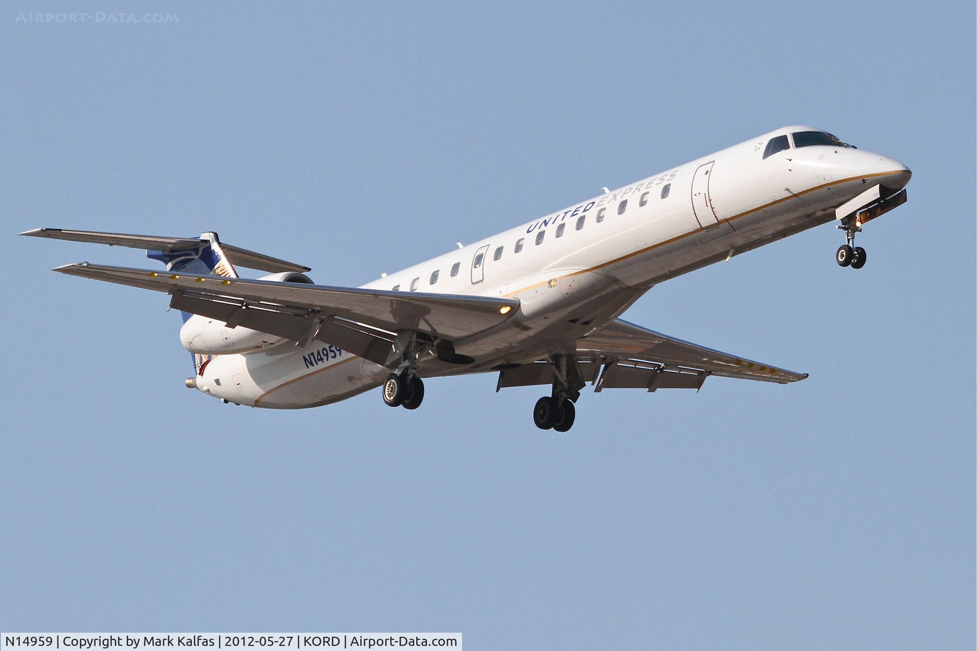 N14959, 1998 Embraer ERJ-145LR (EMB-145LR) C/N 145091, ExpressJet Embraer EMB-145LR, ASQ5830 arriving from Richmond Int'l /KRIC, RWY 14R approach KORD>