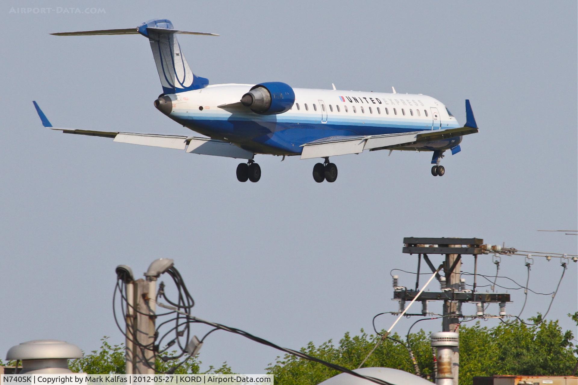 N740SK, 2005 Bombardier CRJ-701 (CL-600-2C10) Regional Jet C/N 10196, SkyWest/United Express Bombardier CL-600-2C10, SKW5545 arriving Edmonton Int'l /CYEG, on short final for RWY 14R Chicago O'Hare/KORD.