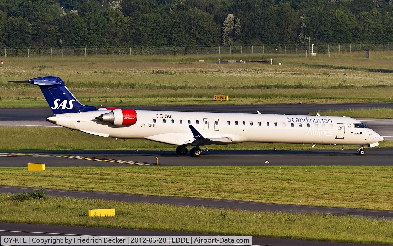 OY-KFE, 2009 Bombardier CRJ-900ER (CL-600-2D24) C/N 15224, taxying to the active