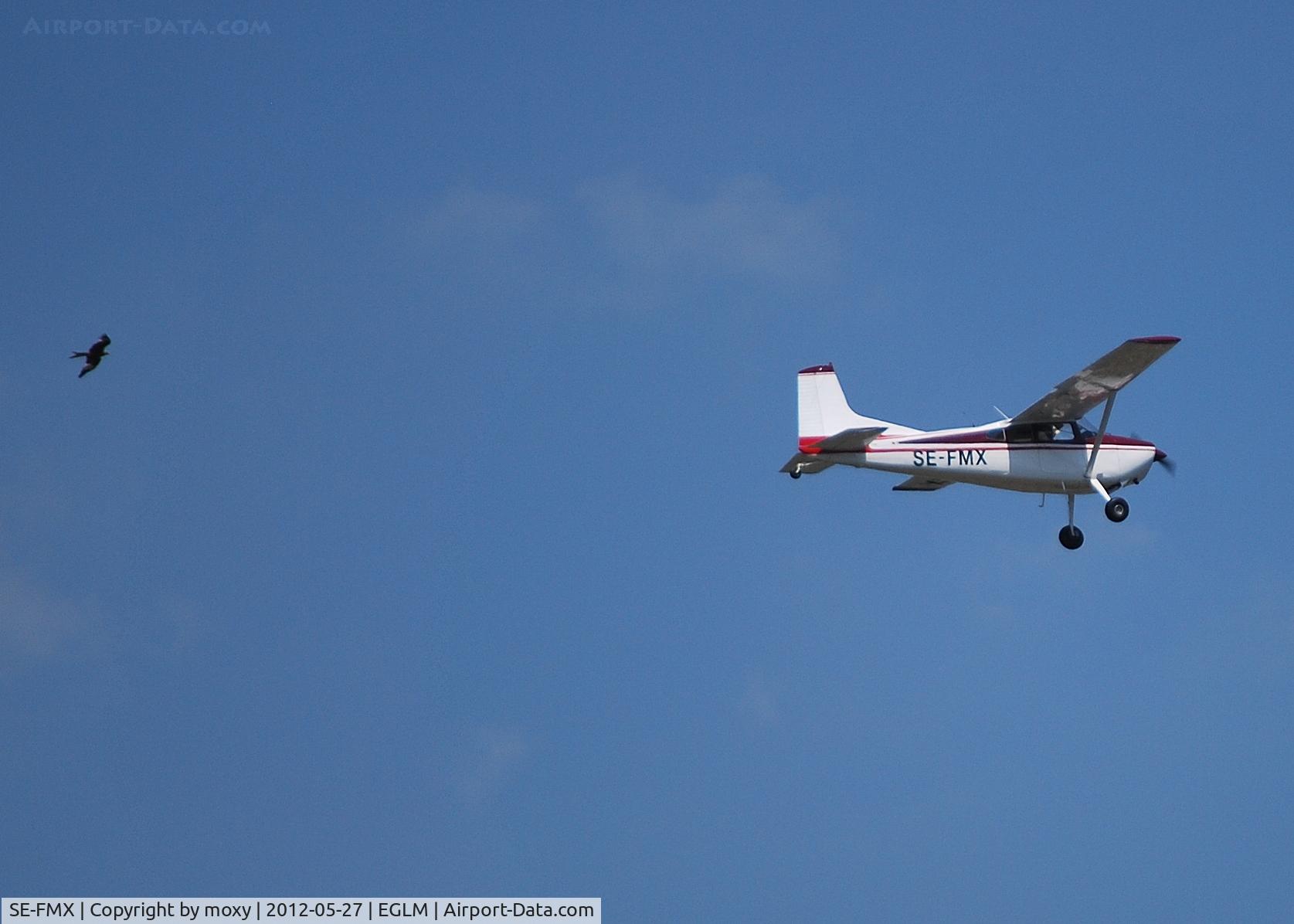 SE-FMX, Cessna A185E Skywagon 185 C/N 185-01740, Cessna A185E Skywagon being chased out of White Waltham by a Red Kite. Ex N1986U