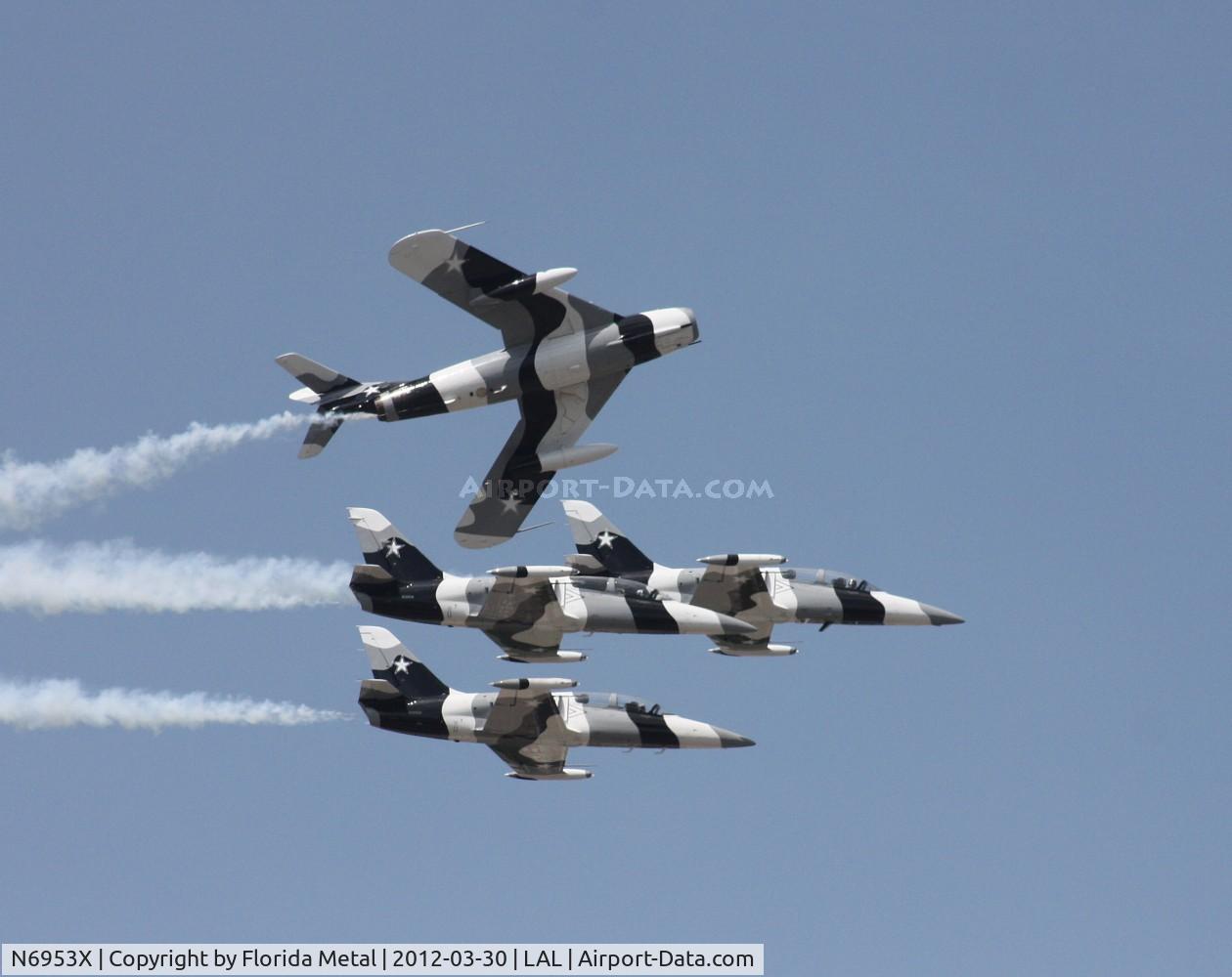 N6953X, PZL-Mielec Lim-6 (MiG-17) C/N 1J0511, Mig 17 circling L-39s of Black Diamond Jet Team