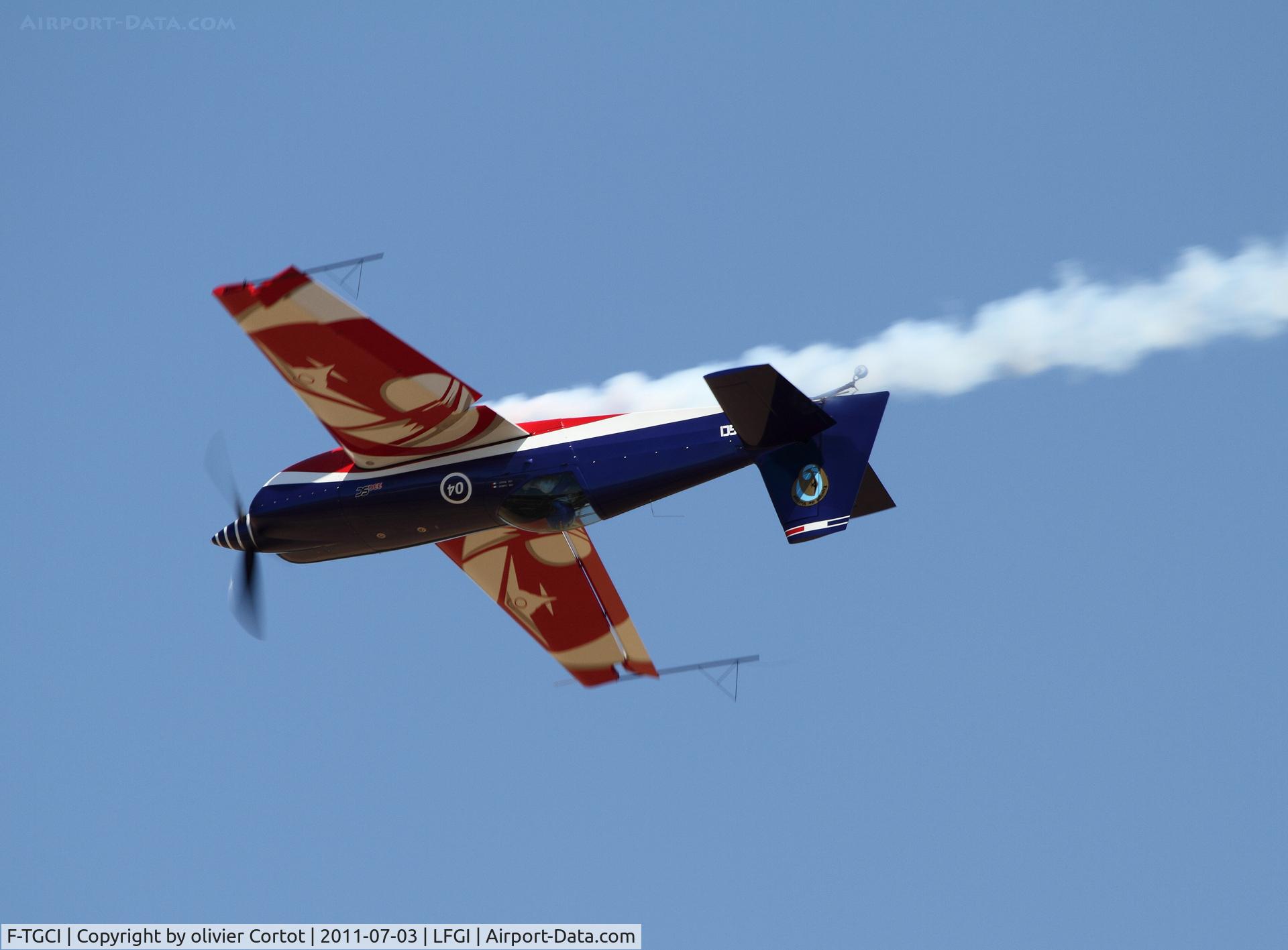 F-TGCI, Extra EA-330SC C/N 04, caught in the middle of a roll
