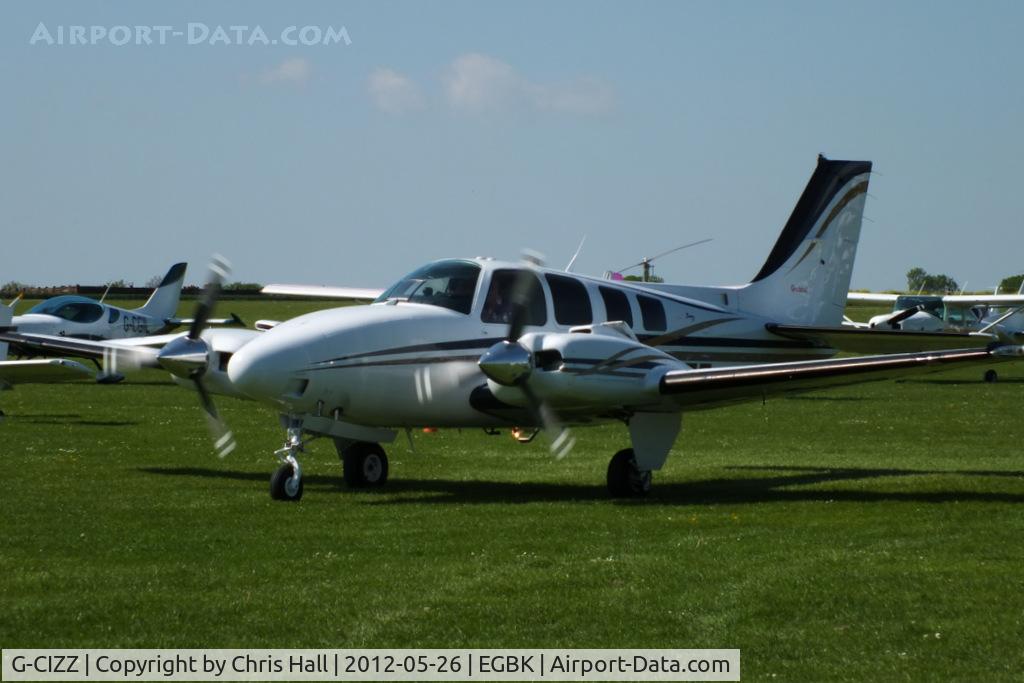G-CIZZ, 2002 Beech 58 Baron C/N TH-2041, at AeroExpo 2012
