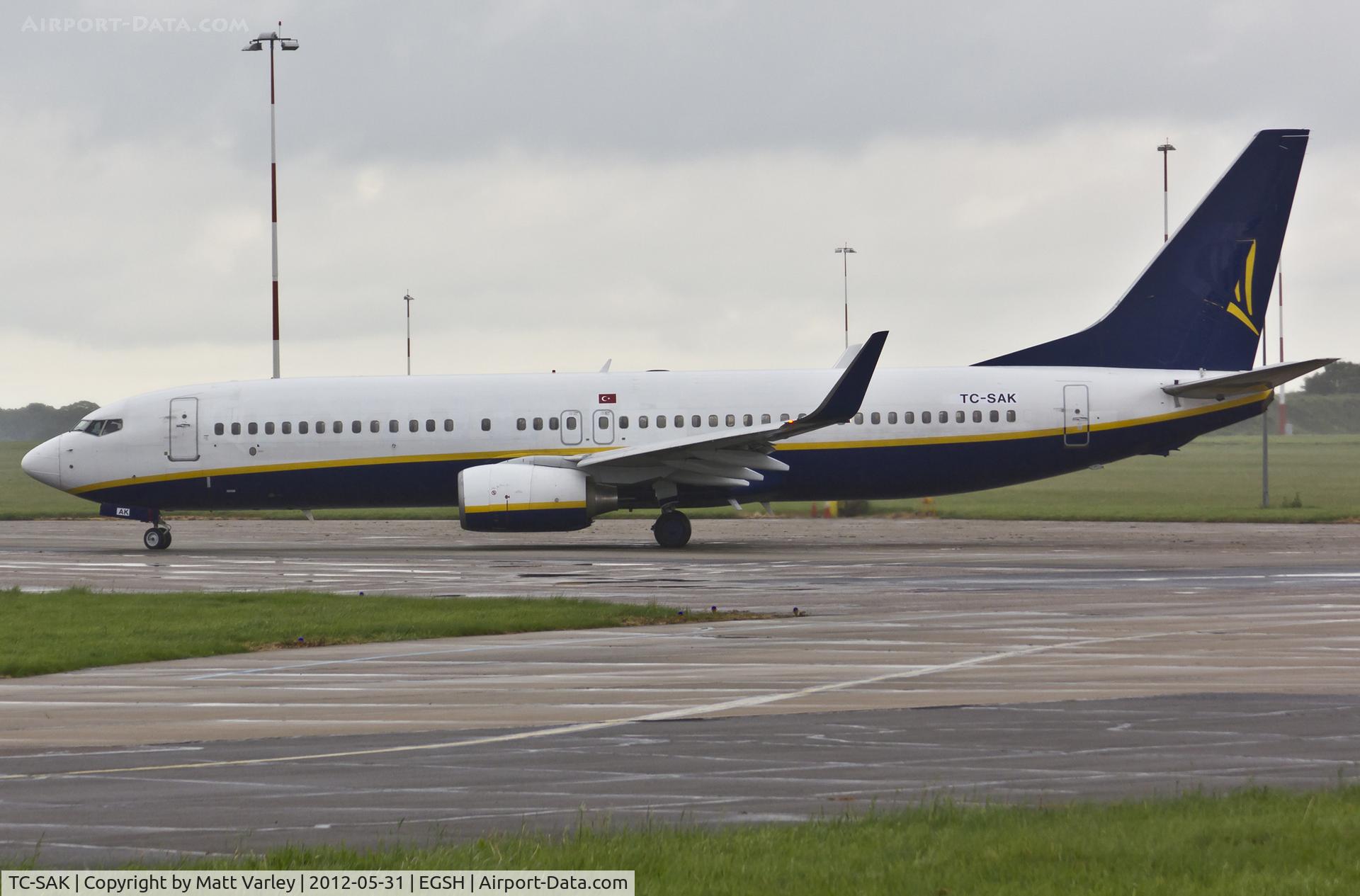 TC-SAK, 2005 Boeing 737-8AS C/N 33820, Departing EGSH in the rain.