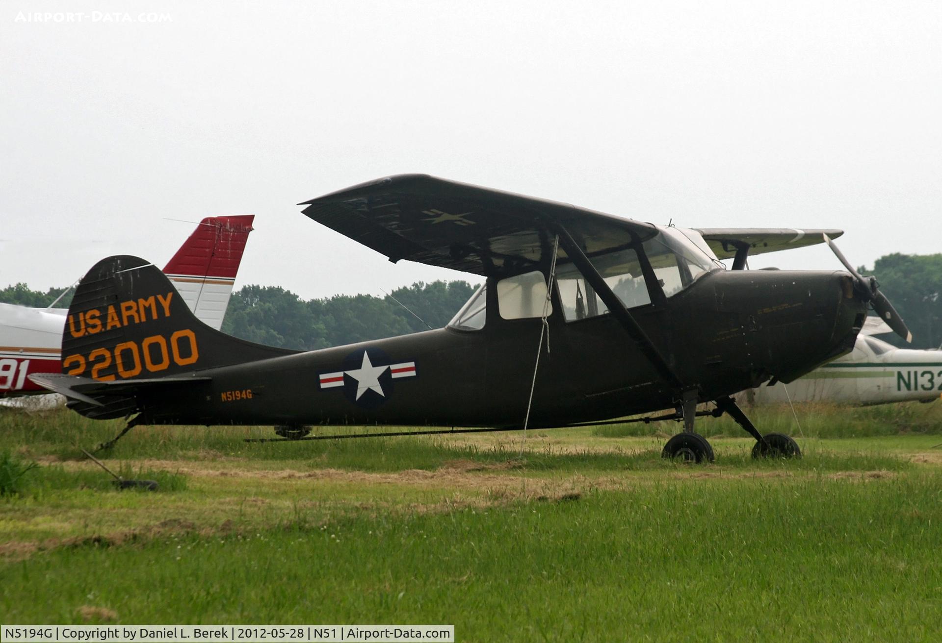 N5194G, 1951 Cessna 305A C/N 22000, The hook and rod beneath this old warrior shows she had been used for aerial advertising work.  The 
