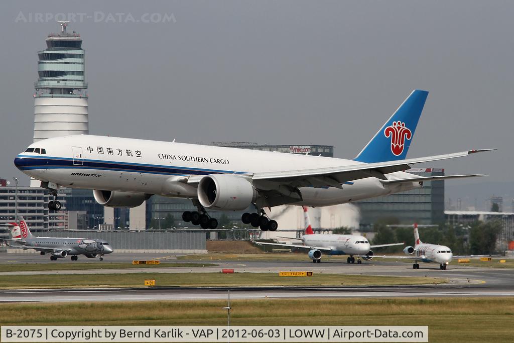 B-2075, 2009 Boeing 777-F1B C/N 37312, Shortly before touching down on Rwy 16