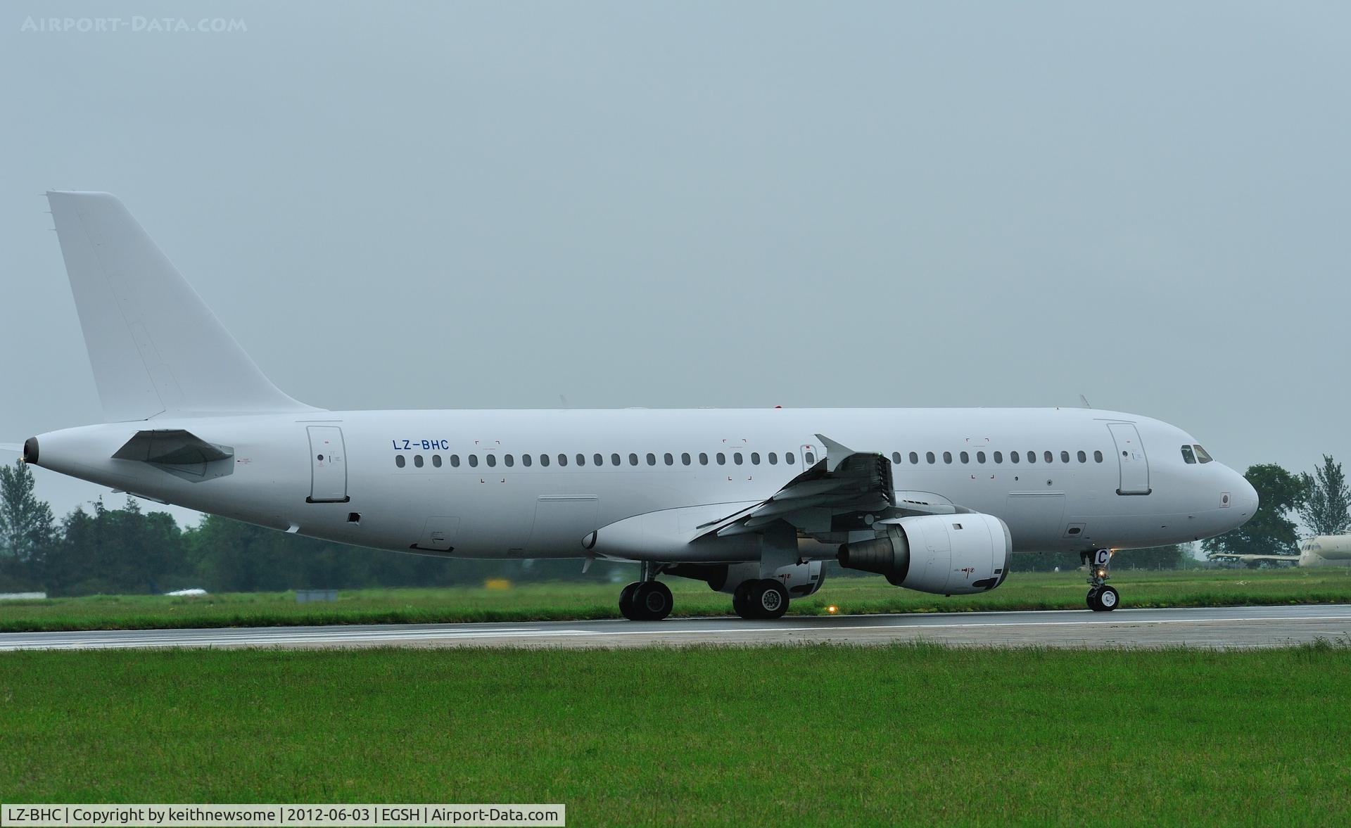 LZ-BHC, 1992 Airbus A320-212 C/N 349, Lining up to leave Norwich on a very wet Sunday morning, imaginative paintwork ??
