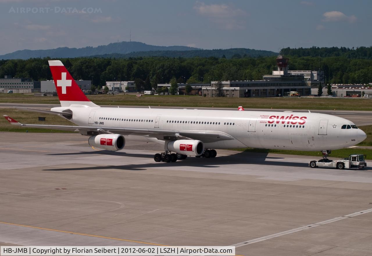HB-JMB, 2003 Airbus A340-313 C/N 545, getting towed to the gate