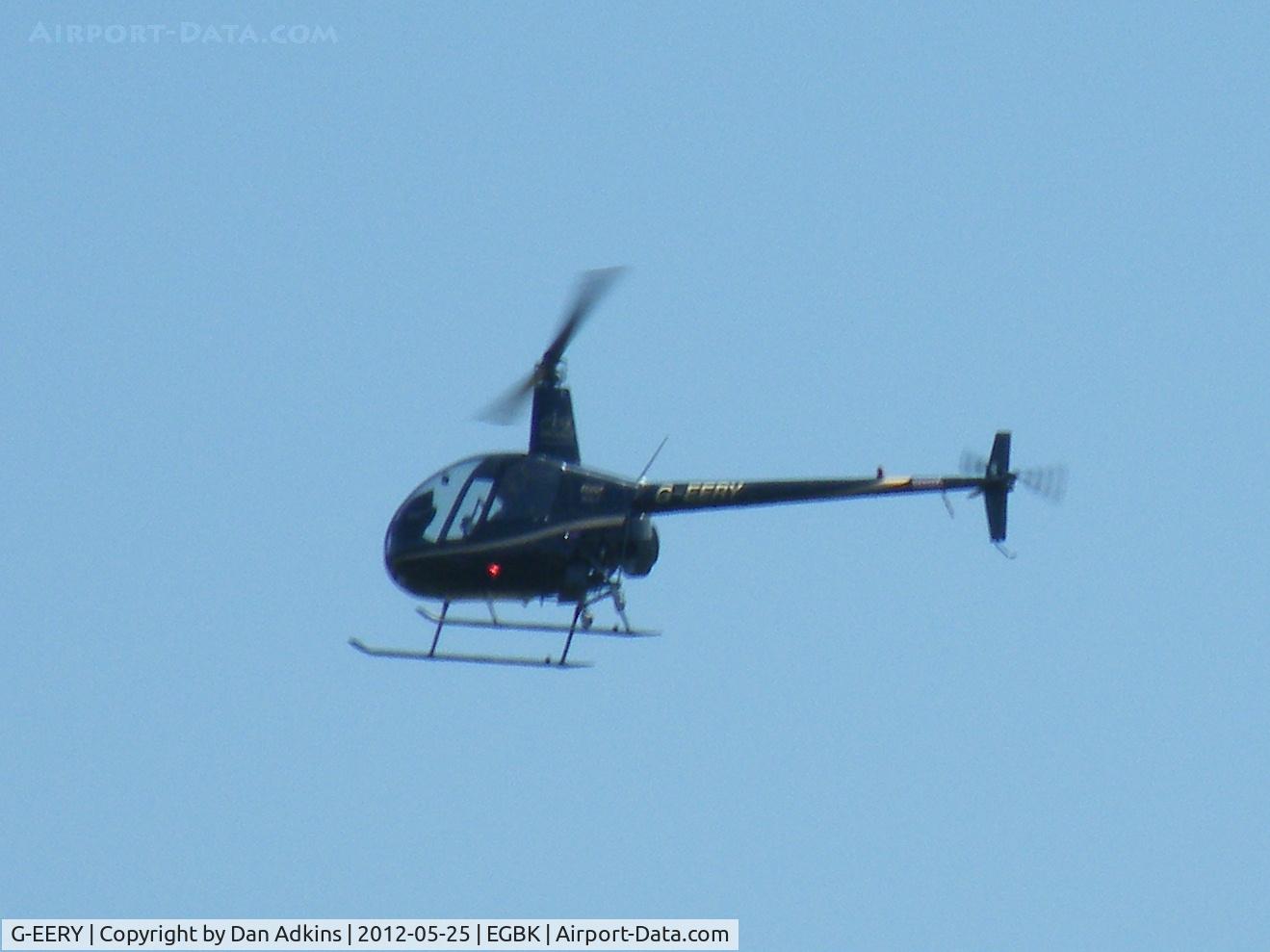 G-EERY, 2007 Robinson R22 Beta C/N 4128, G-EERY flies above the AeroExpo event at Sywell Aerodrome, Northamptonshire, UK, 25th May 2012.