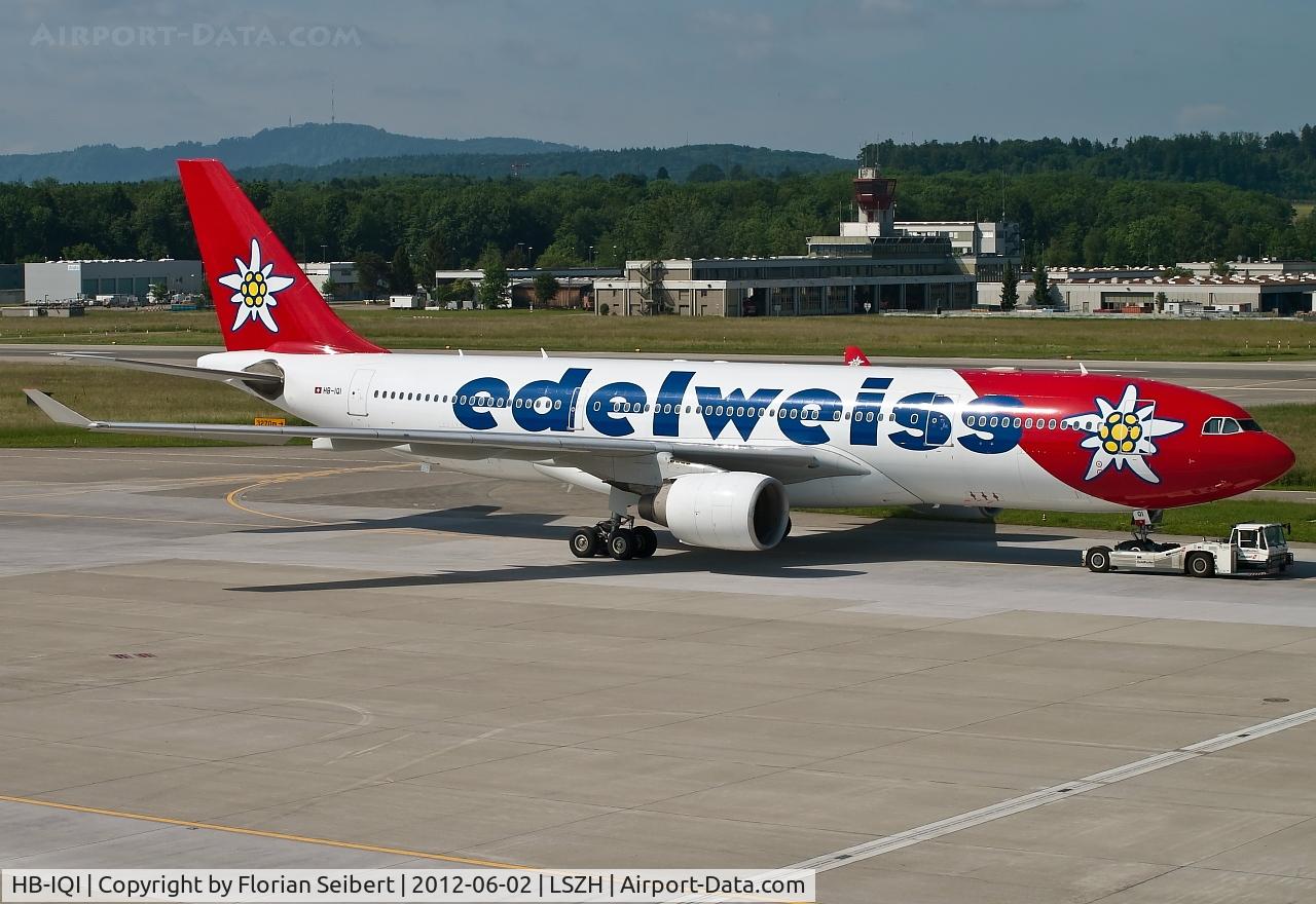 HB-IQI, 1999 Airbus A330-223 C/N 291, getting towed to the gate