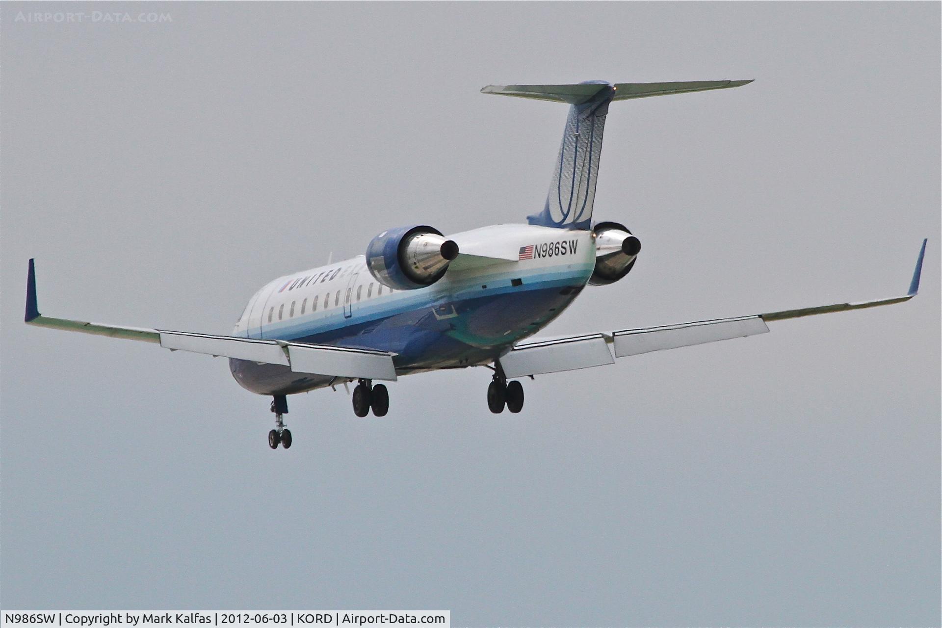 N986SW, 2004 Bombardier CRJ-200ER (CL-600-2B19) C/N 7967, SkyWest/ United Express Bombardier CL-600-2B19, SKW5517 arriving from Kansas City /KMCI, RWY 28 approach KORD.