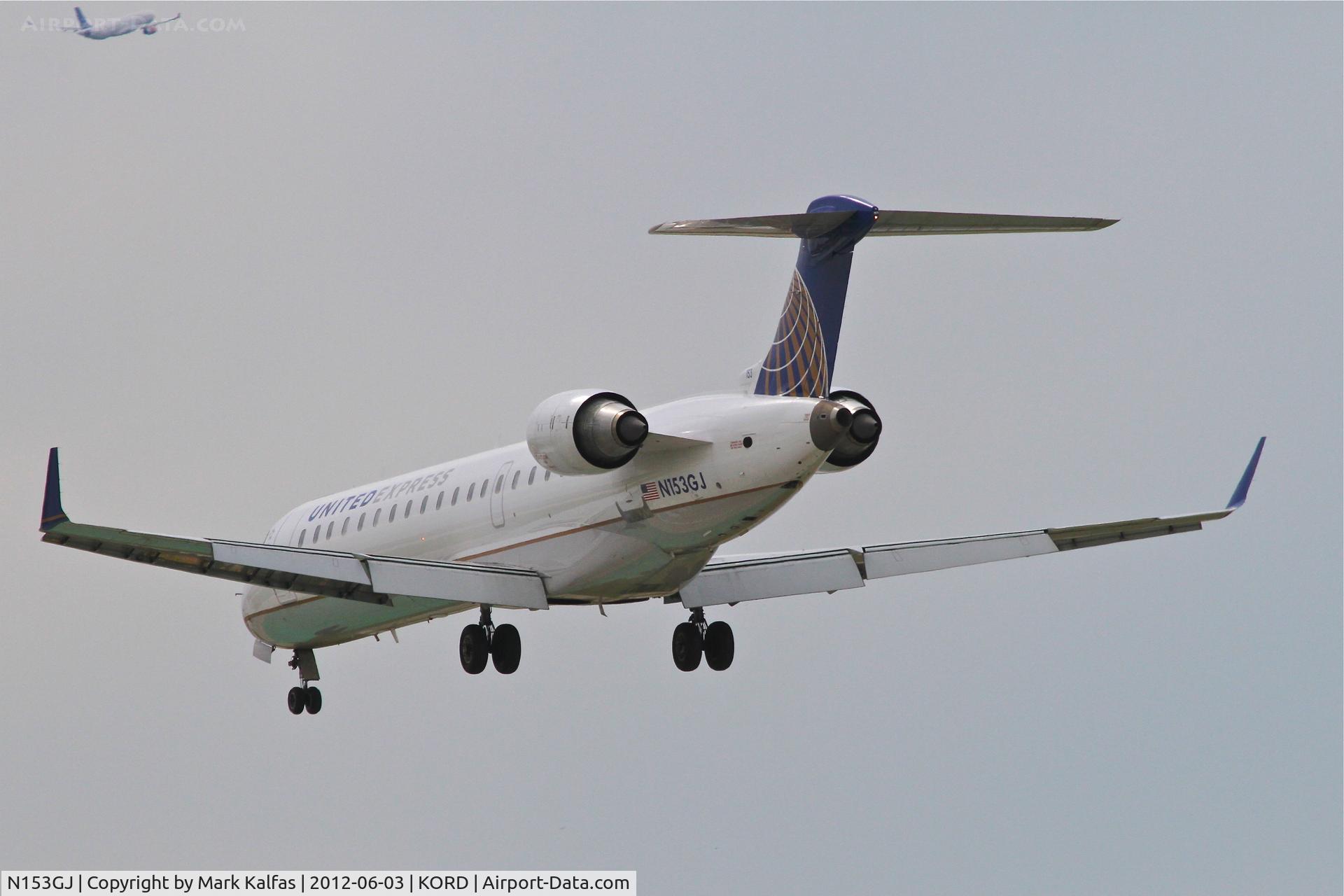 N153GJ, 2005 Bombardier CRJ-702 (CL-600-2C10) Regional Jet C/N 10219, GoJet Airlines/United Express Bombardier CL-600-2C10, GJS3618 arriving from New Orleans Intl /KMSY, RWY 28 approach at O'Hare.