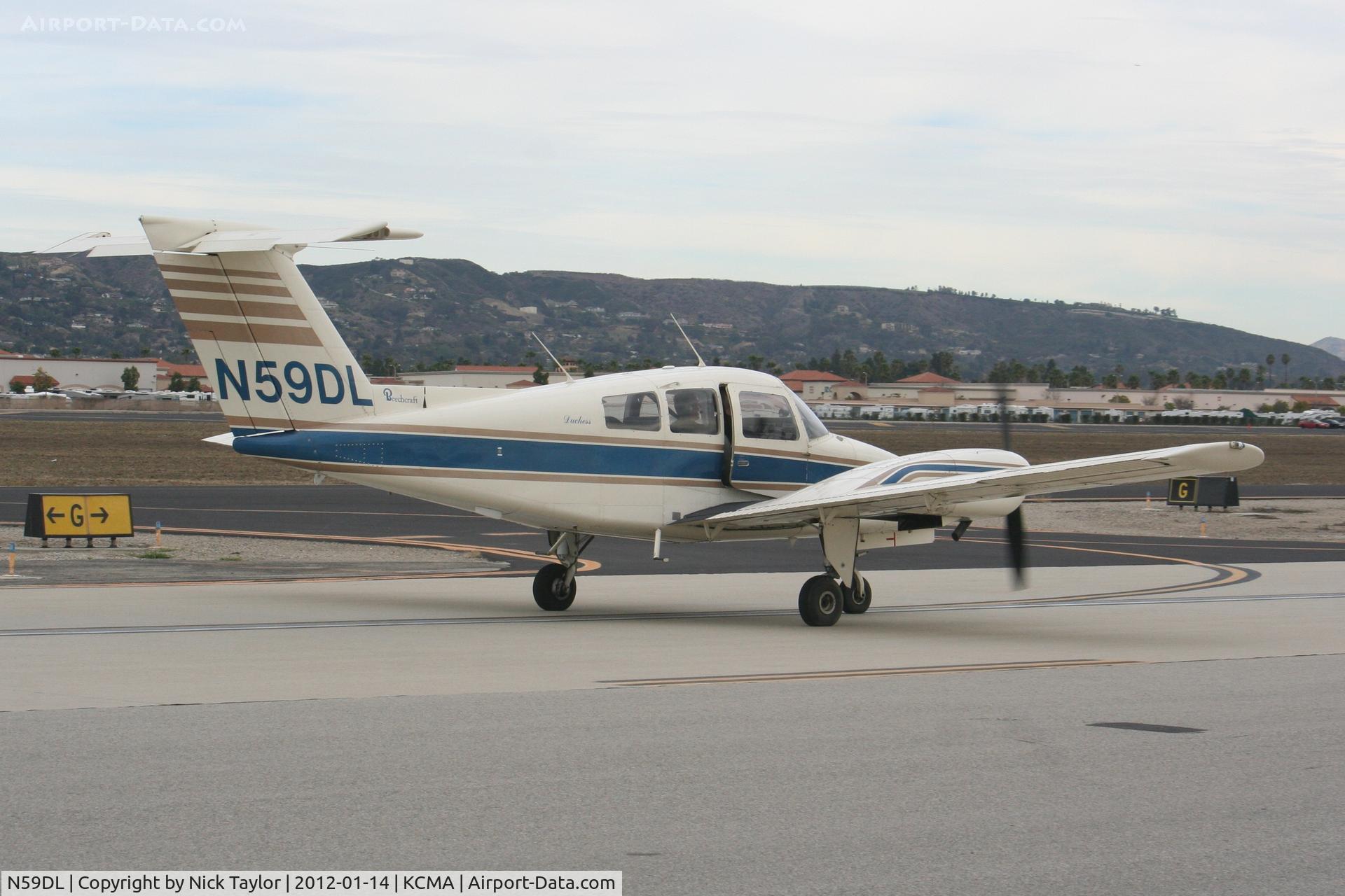 N59DL, 1979 Beech 76 Duchess C/N ME-143, Taxiing from 26