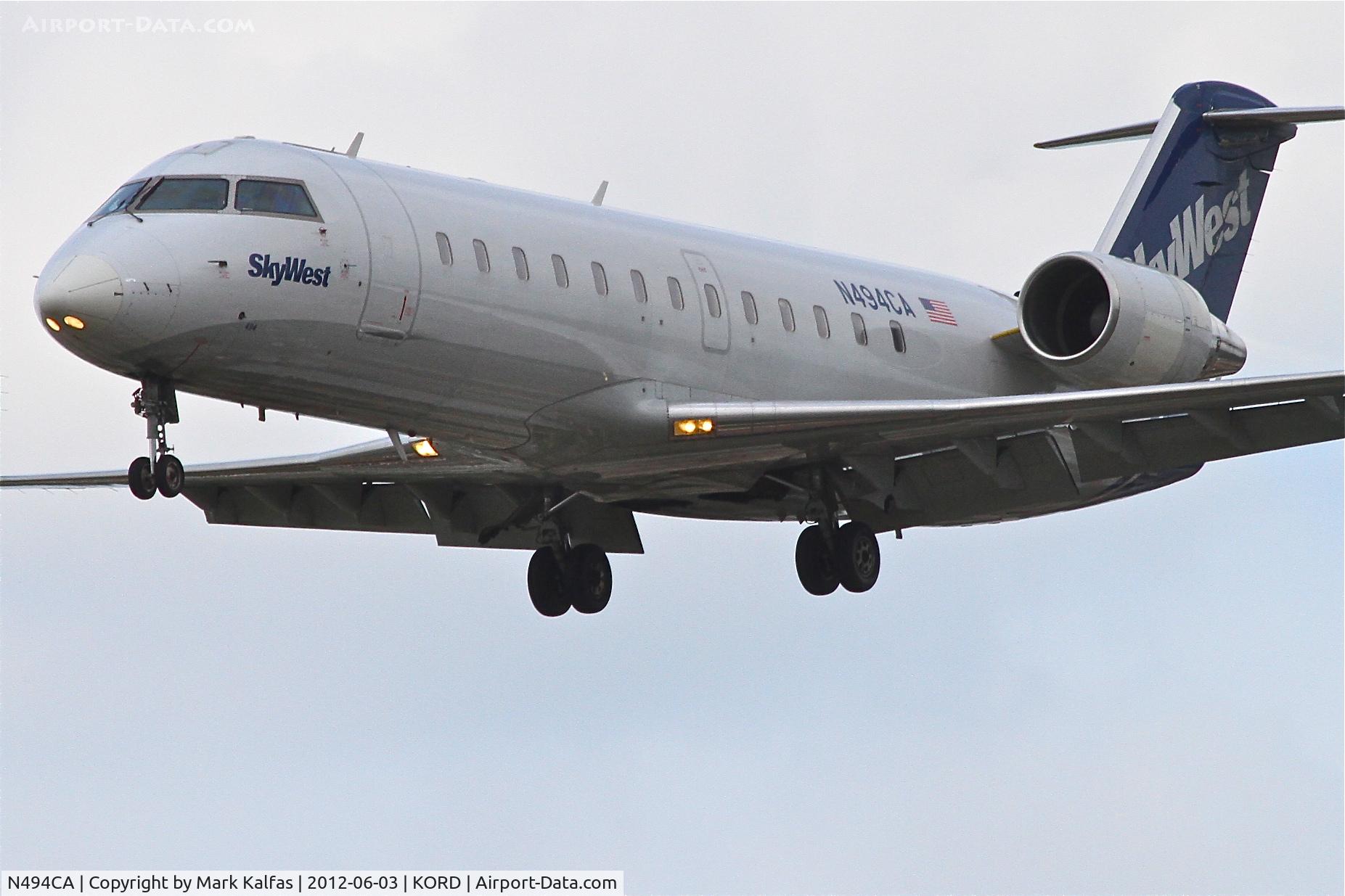N494CA, 2003 Bombardier CRJ-200ER (CL-600-2B19) C/N 7765, SkyWest/United Express Bombardier CL-600-2B19, SKW6220 arriving from Moline, Illinois-Quad City International/KMLI, RWY 28 approach KORD.
