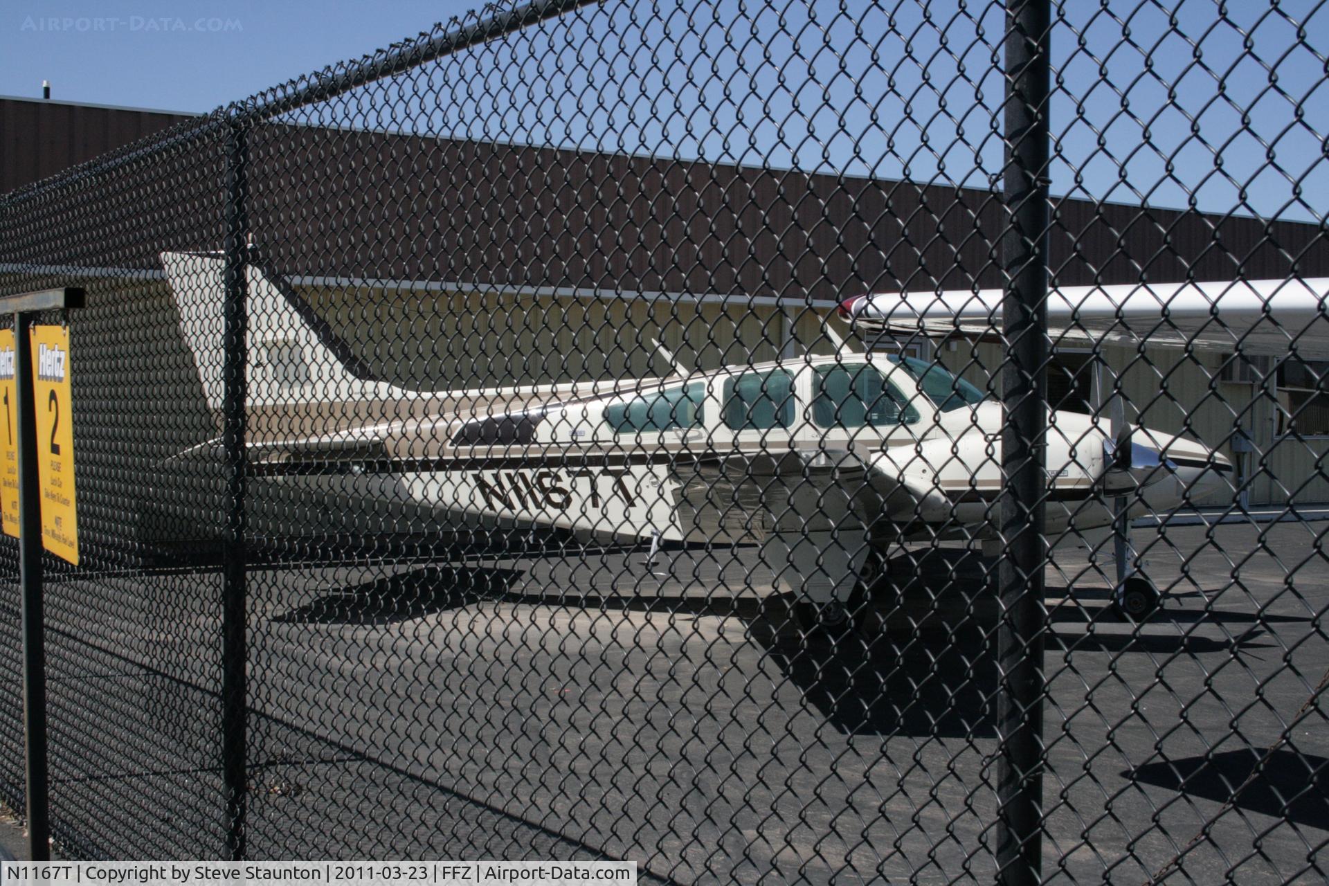 N1167T, 1975 Beech 95-B55 Baron Baron C/N TC-1864, Taken at Falcon Field Airport, in March 2011 whilst on an Aeroprint Aviation tour