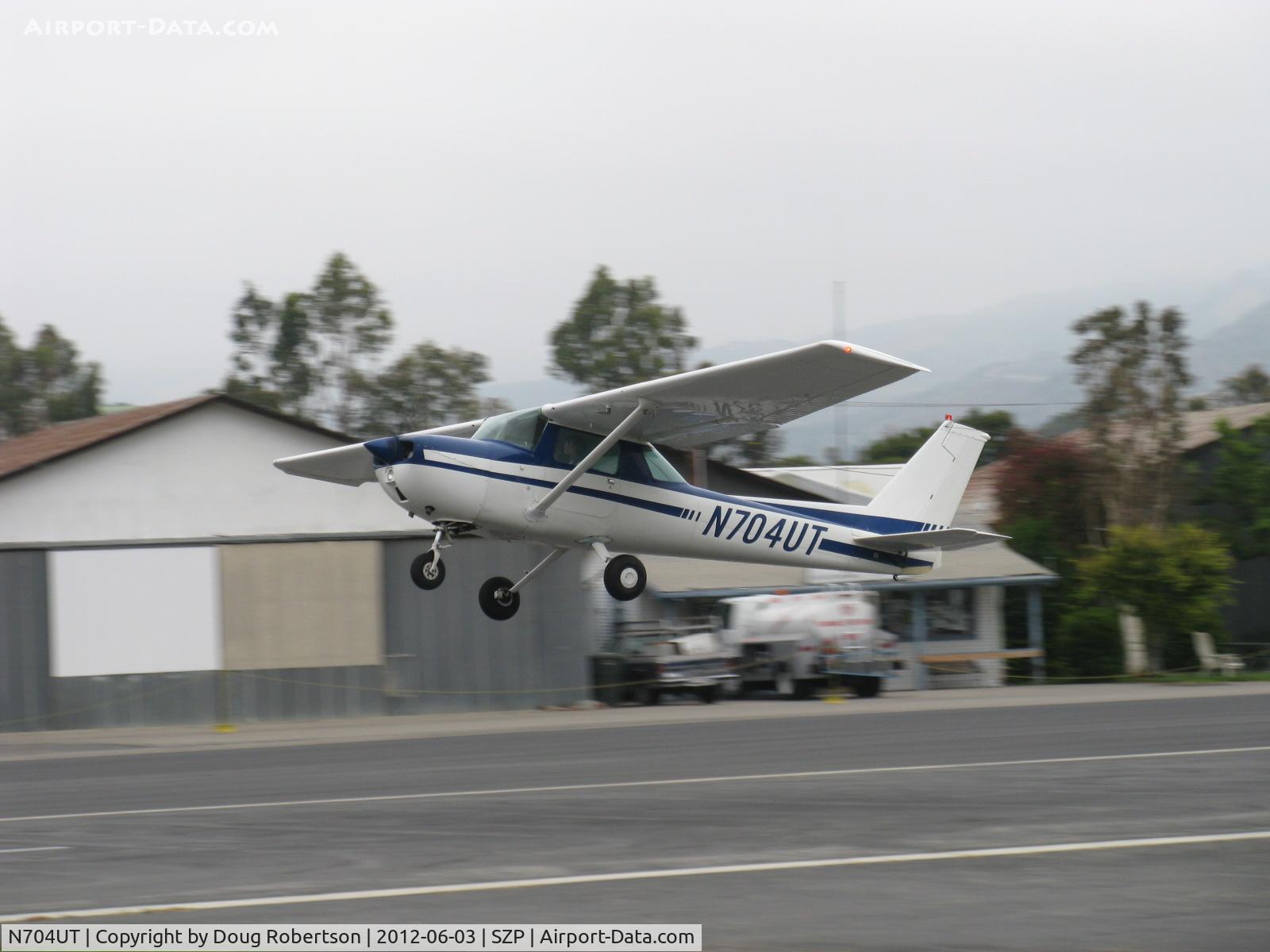 N704UT, 1976 Cessna 150M C/N 15078891, 1976 Cessna 150M, Continental O-200 100 Hp, another takeoff climb Rwy 22