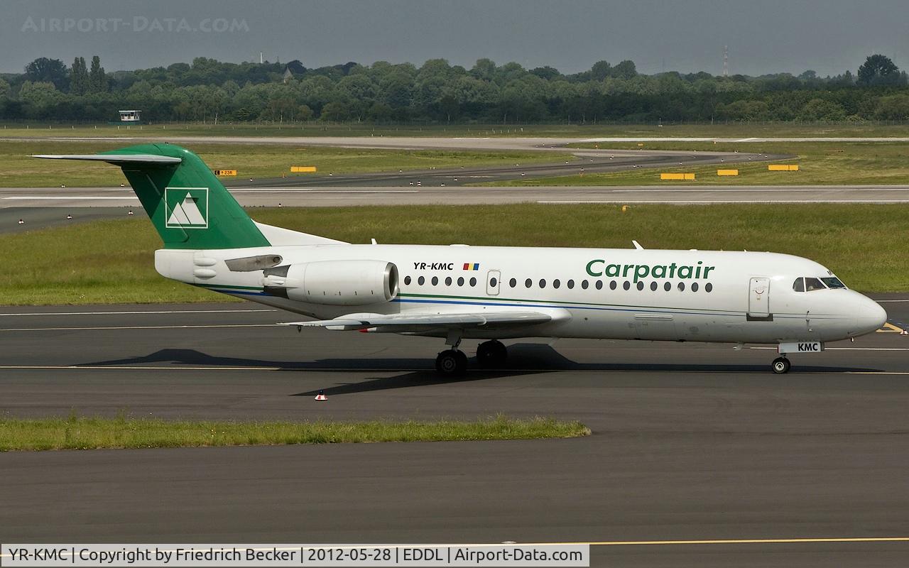YR-KMC, 1996 Fokker 70 (F-28-0070) C/N 11569, taxying to the active