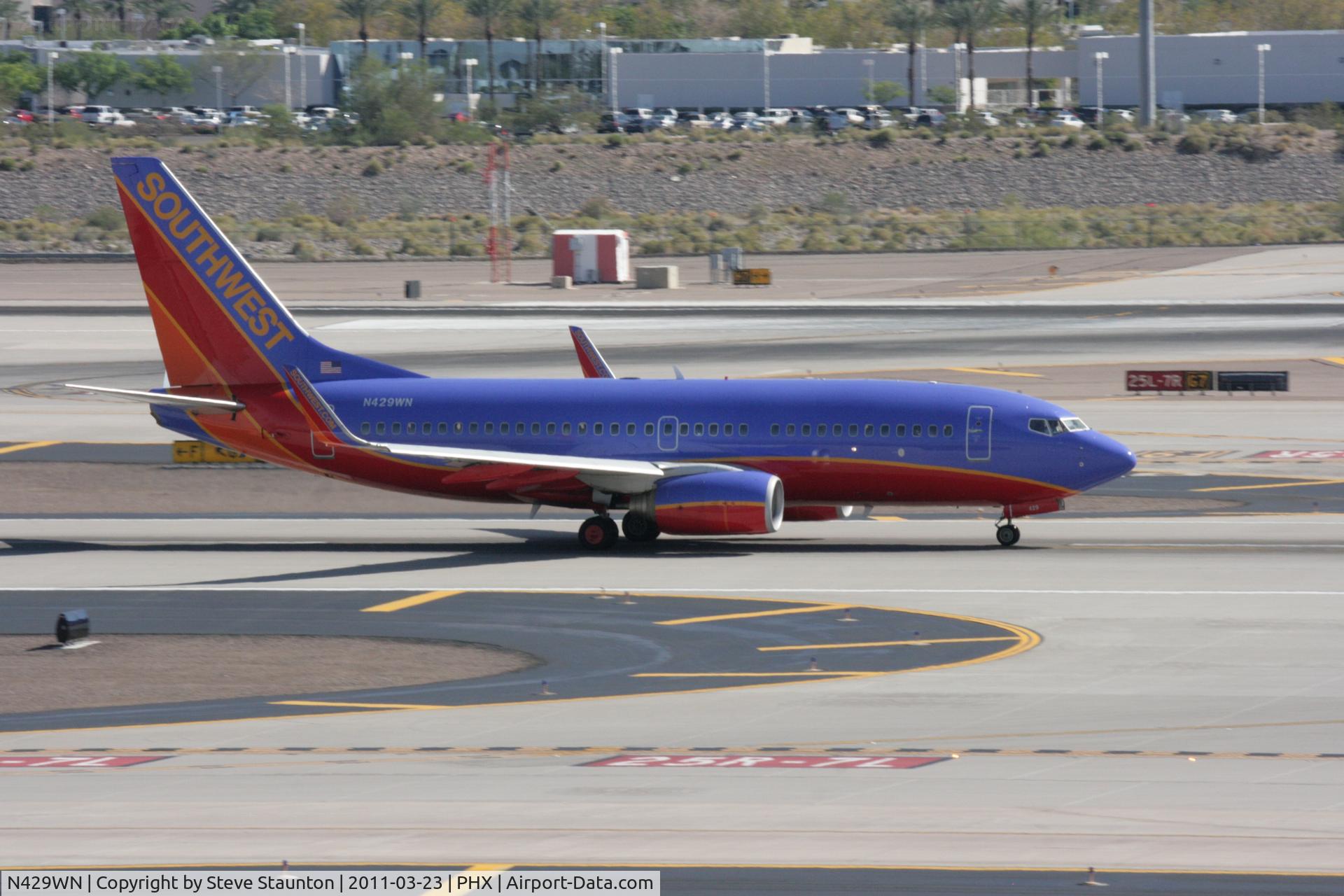 N429WN, 2002 Boeing 737-7H4 C/N 33658, Taken at Phoenix Sky Harbor Airport, in March 2011 whilst on an Aeroprint Aviation tour