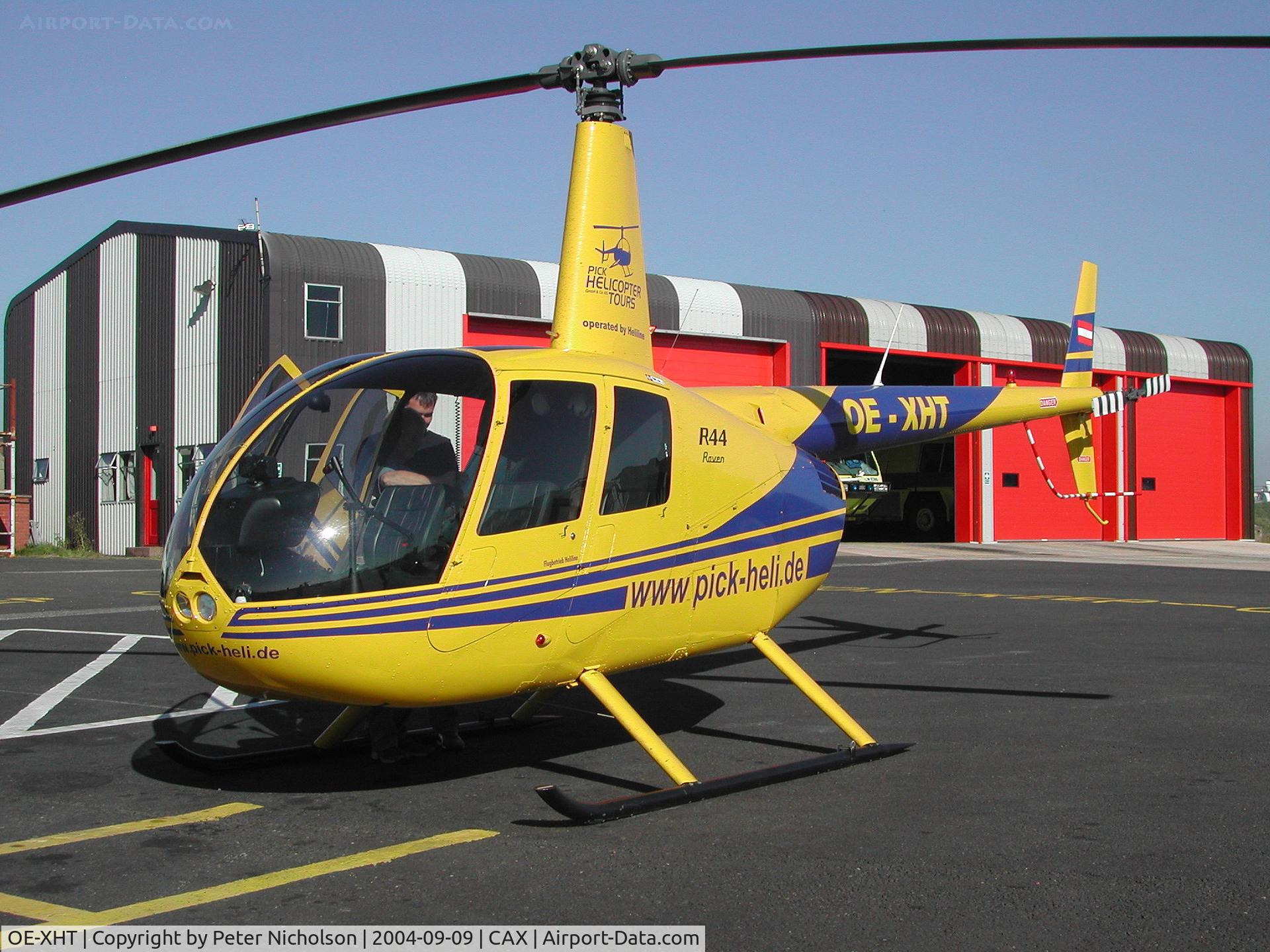 OE-XHT, Robinson R44 Raven C/N 979, Robinson Raven seen at Carlisle in September 2004.