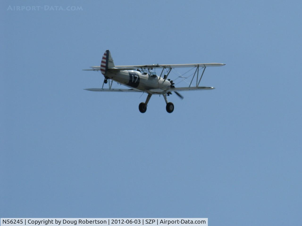 N56245, 1941 Boeing A75N1(PT17) C/N 75-4284, 1942 Boeing Stearman A75N1 (PT-17), Jacobs R755-B2M 275 Hp upgrade, takeoff climb Rwy 22 chasing N1942 1942 Boeing Stearman