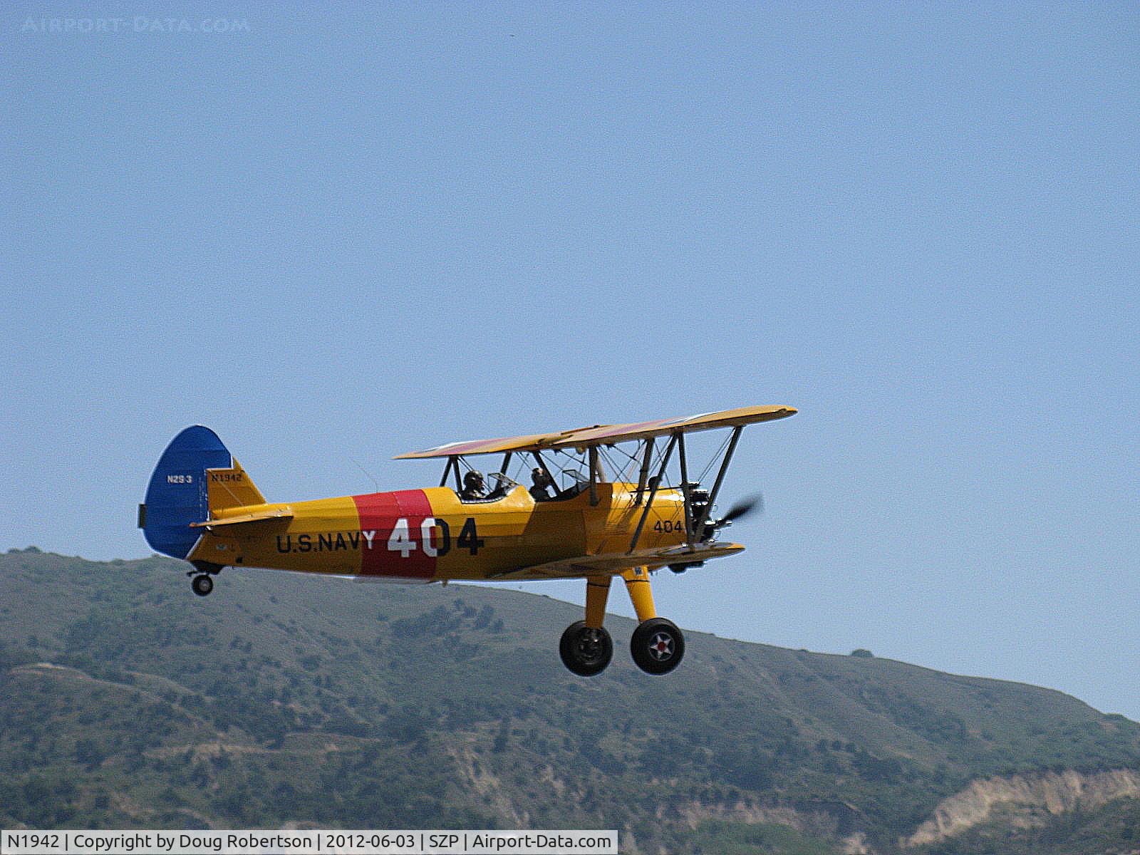 N1942, 1942 Boeing A75N1(PT17) C/N 75-6754, 1942 Boeing Stearman A75N1 as Navy N2S-3, Continental W670 220 Hp, takeoff climb Rwy 22