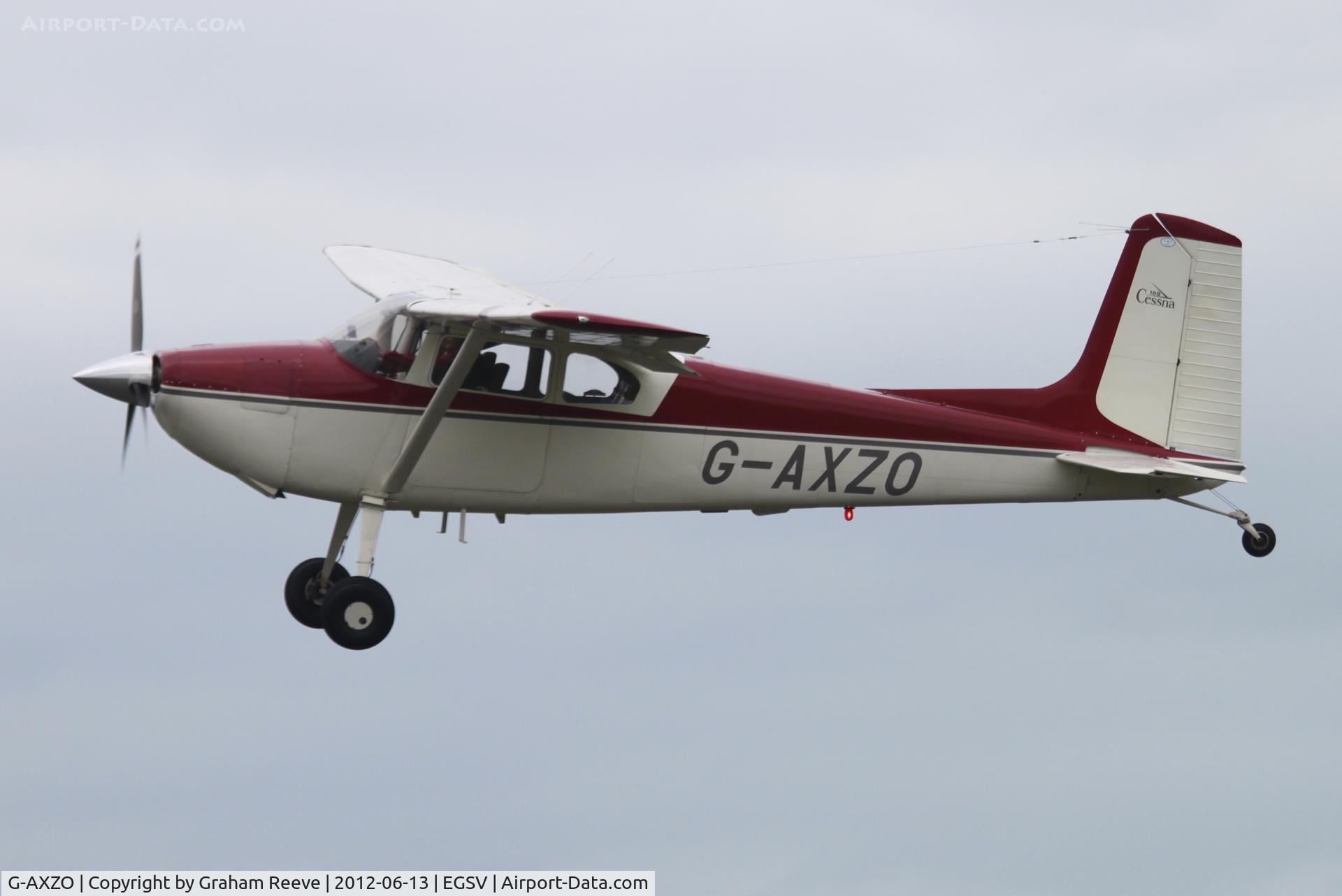 G-AXZO, 1954 Cessna 180 C/N 31137, Just taken off.