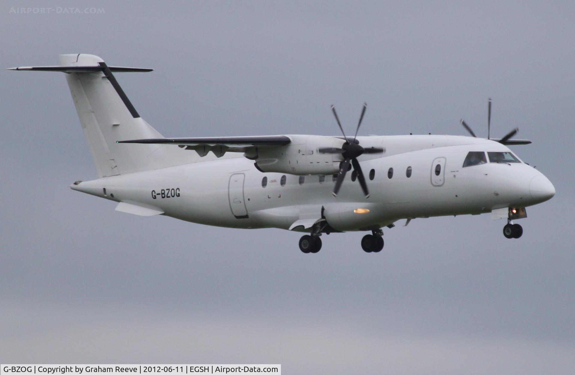 G-BZOG, 1998 Dornier 328-100 C/N 3088, About to land.