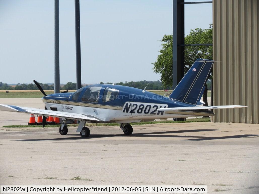 N2802W, 1991 Socata TB21TC Trinidad C/N 1137, Parked next to a hanger