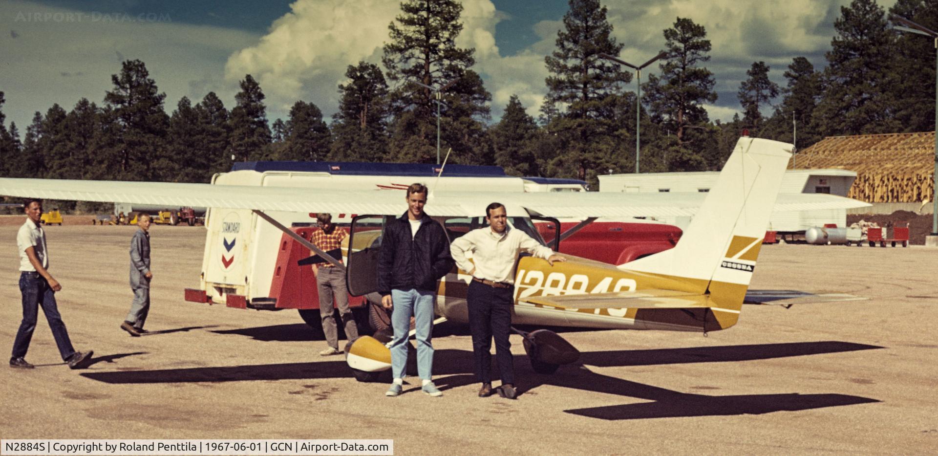 N2884S, Piper PA-28-161 C/N 287916509, Cessna 150 sitting at Grand Canyon Airport in 1967.  Russ Madsen is on the left and the pilot, Roland Penttila, is on the right.  The airplane was owned by the FBO, Rose Aviation, out of Hawthorne Airport in California