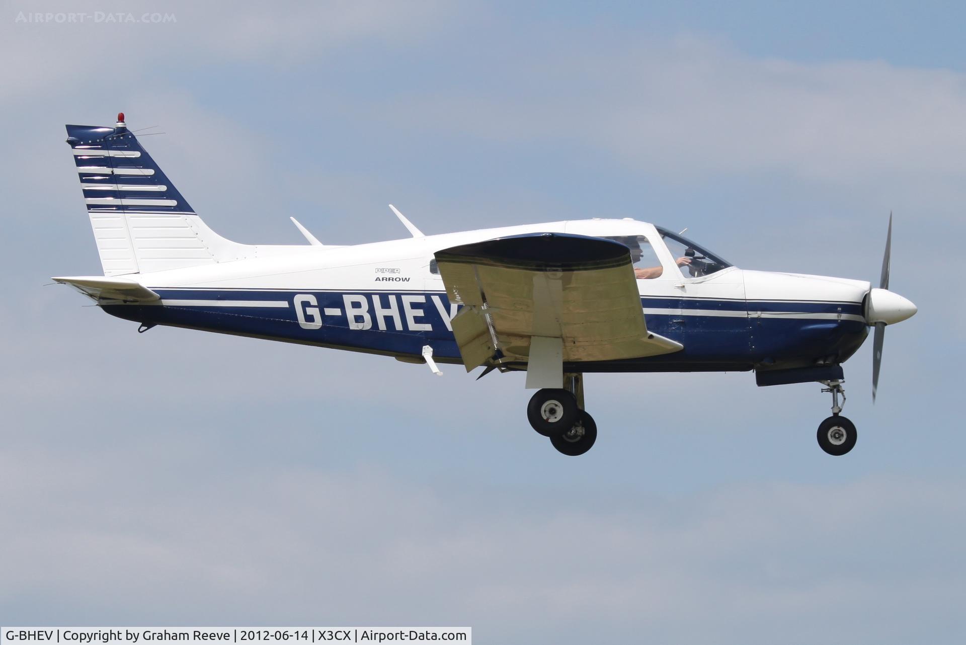 G-BHEV, 1974 Piper PA-28R-200-2 Cherokee Arrow II C/N 28R-7435159, About to land.