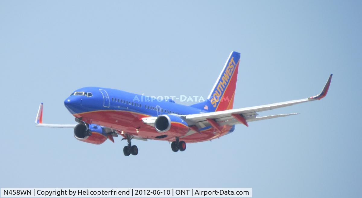 N458WN, 2004 Boeing 737-7H4 C/N 33857, On 1/2 mile final for 26R