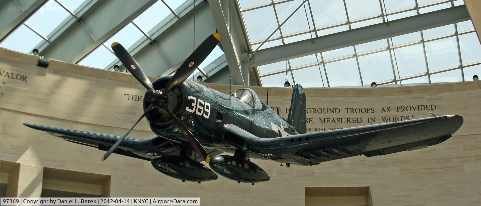 97369, Vought F4U-4 Corsair C/N 9523, This Corsair makes an impressive diplay, with the insicribed quotations in the background.