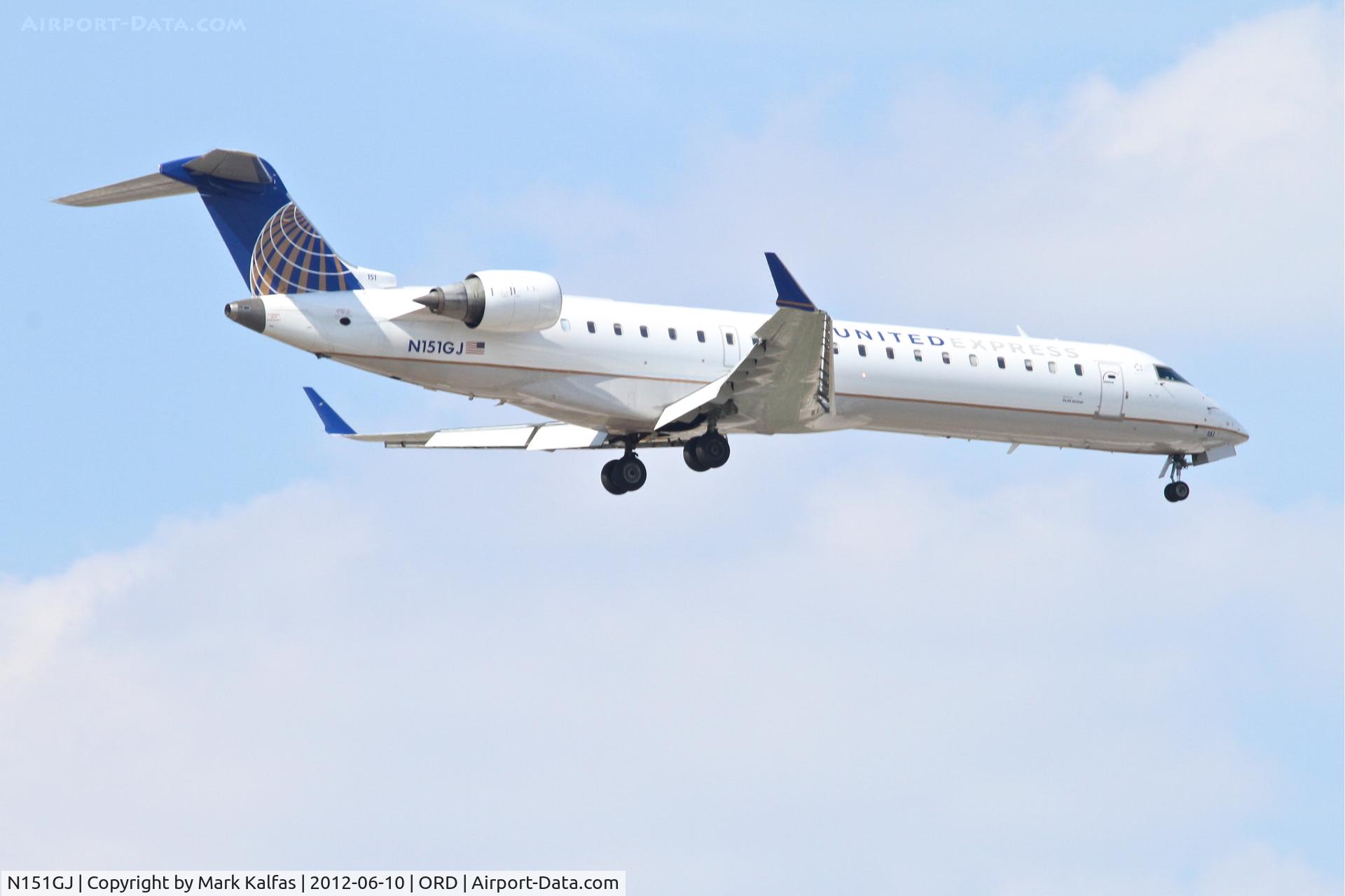 N151GJ, 2005 Bombardier CRJ-702 (CL-600-2C10) Regional Jet C/N 10216, GoJet Airlines/ United Express  Bombardier CL-600-2C10, GJS3618 arriving from KMSY, RWY 10 approach KORD.