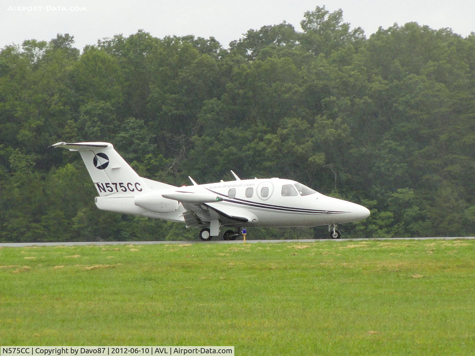 N575CC, 2007 Eclipse Aviation Corp EA500 C/N 000075, Landing at Asheville, NC airport in the rain on June 10, 2012.