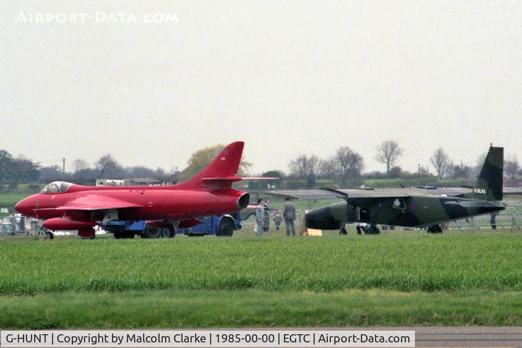 G-HUNT, 1956 Hawker Hunter F.51 C/N 41H-680277, Hawker Hunter F51 with G-DLRA Britten-Norman BN-2 Astor at Cranfield in 1985.