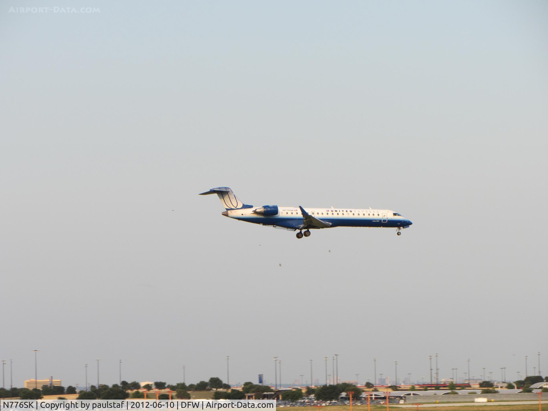 N776SK, 2006 Bombardier CRJ-700 (CL-600-2C10) Regional Jet C/N 10241, Landing at DFW.