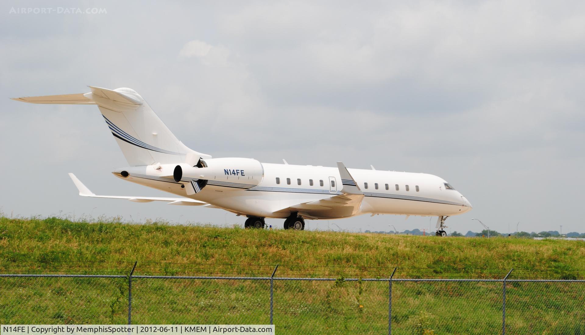N14FE, 2000 Bombardier BD-700-1A10 Global Express C/N 9070, N14FE is seen here at Memphis International on taxiway N. N14FE is one of FedEx Express's CEO planes and also is a Bombardier GLEX