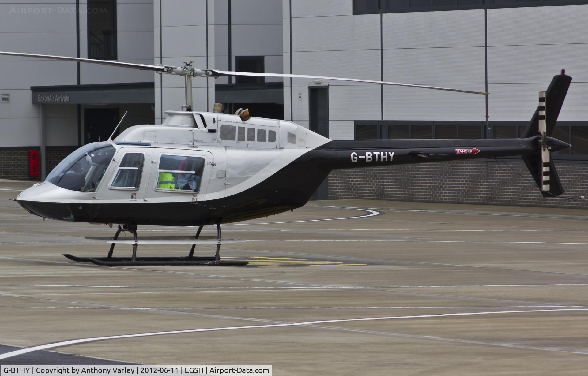 G-BTHY, 1977 Bell 206B JetRanger III C/N 2290, Sat on stand at SaxonAir.