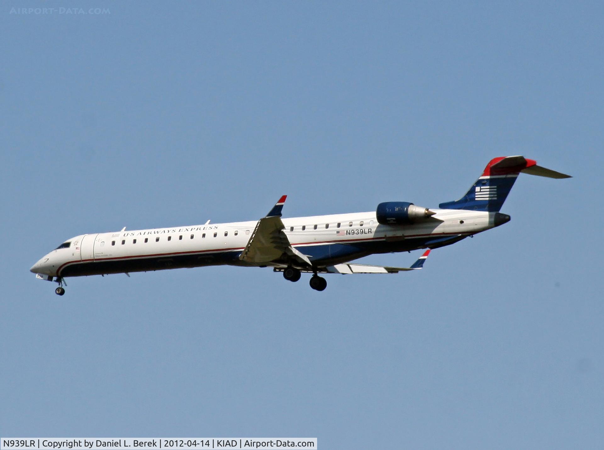 N939LR, 2005 Bombardier CRJ-900ER (CL-600-2D24) C/N 15039, This beauty is on finals to the short runway at Dulles International (IAD).