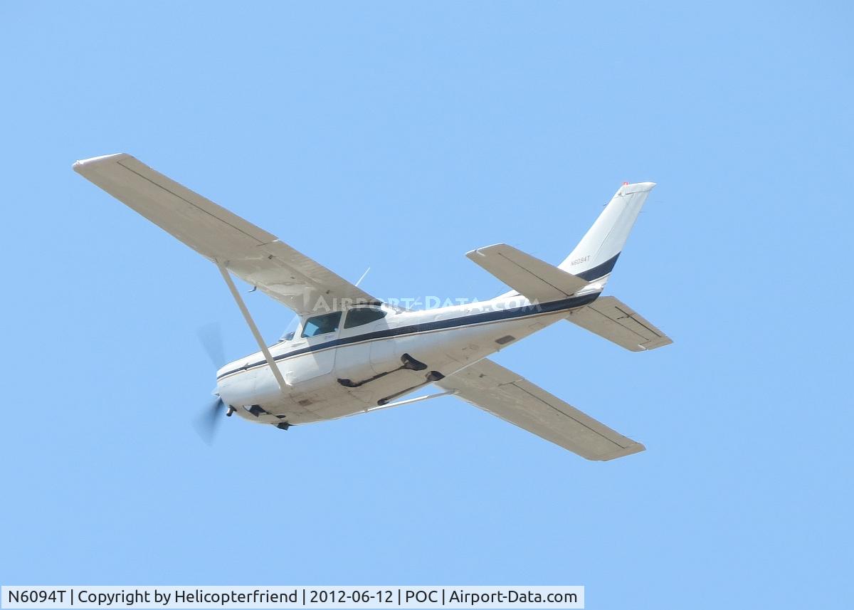 N6094T, 1982 Cessna TR182 Turbo Skylane RG C/N R18201899, Taking off from 26L, climbing and landing gear already retracted