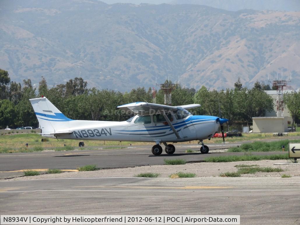 N8934V, 1974 Cessna 172M C/N 17264291, Taxiing eastbound on taxiway Sierra