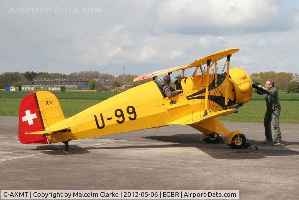 G-AXMT, 1938 Bucker Bu-133C Jungmeister C/N 46, Doflug Bu-133C Jungmeister, starting the engine with a little help at Breighton Airfield's 2012 May-hem Fly-In.