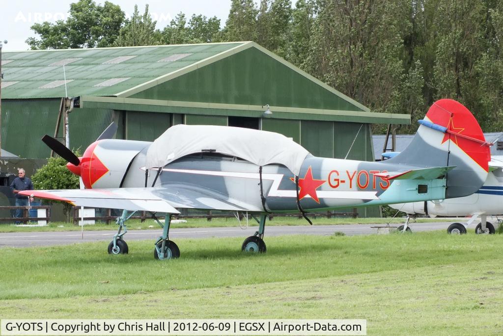 G-YOTS, 1990 Bacau Yak-52 C/N 9010308, at the Air Britain flyin 2012