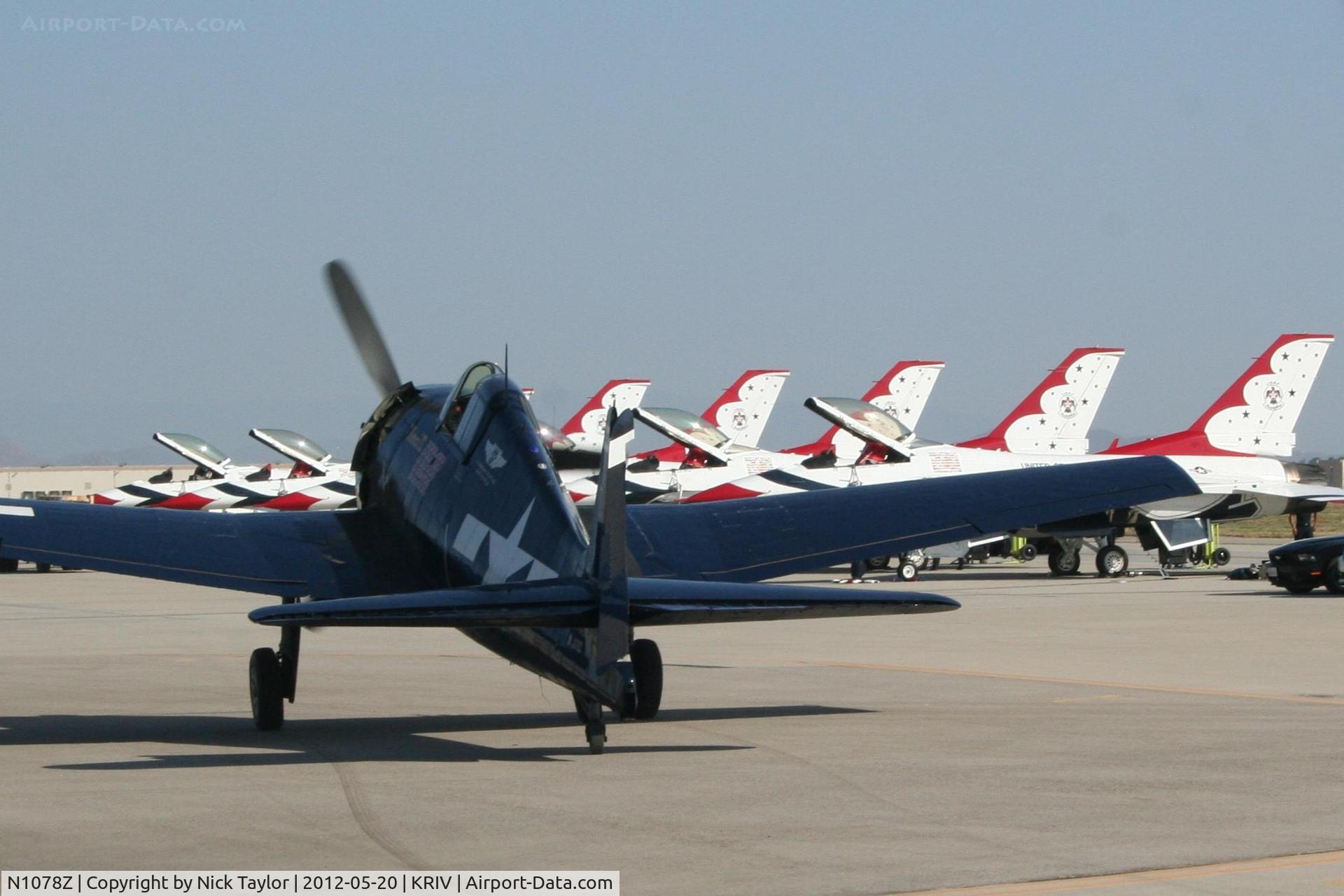 N1078Z, 1963 Grumman F6F-5 Hellcat C/N 27354801-66, Taxiing out past the T-birds