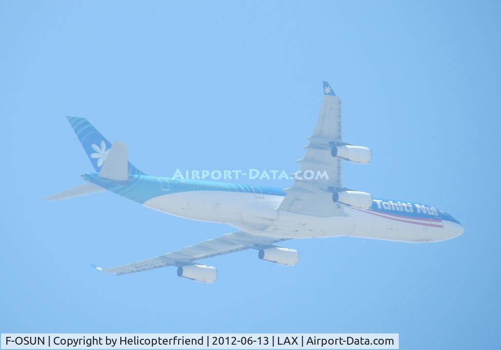 F-OSUN, 2001 Airbus A340-313 C/N 446, Up in the marine layer on a 14 to 15 mile final for runway 25