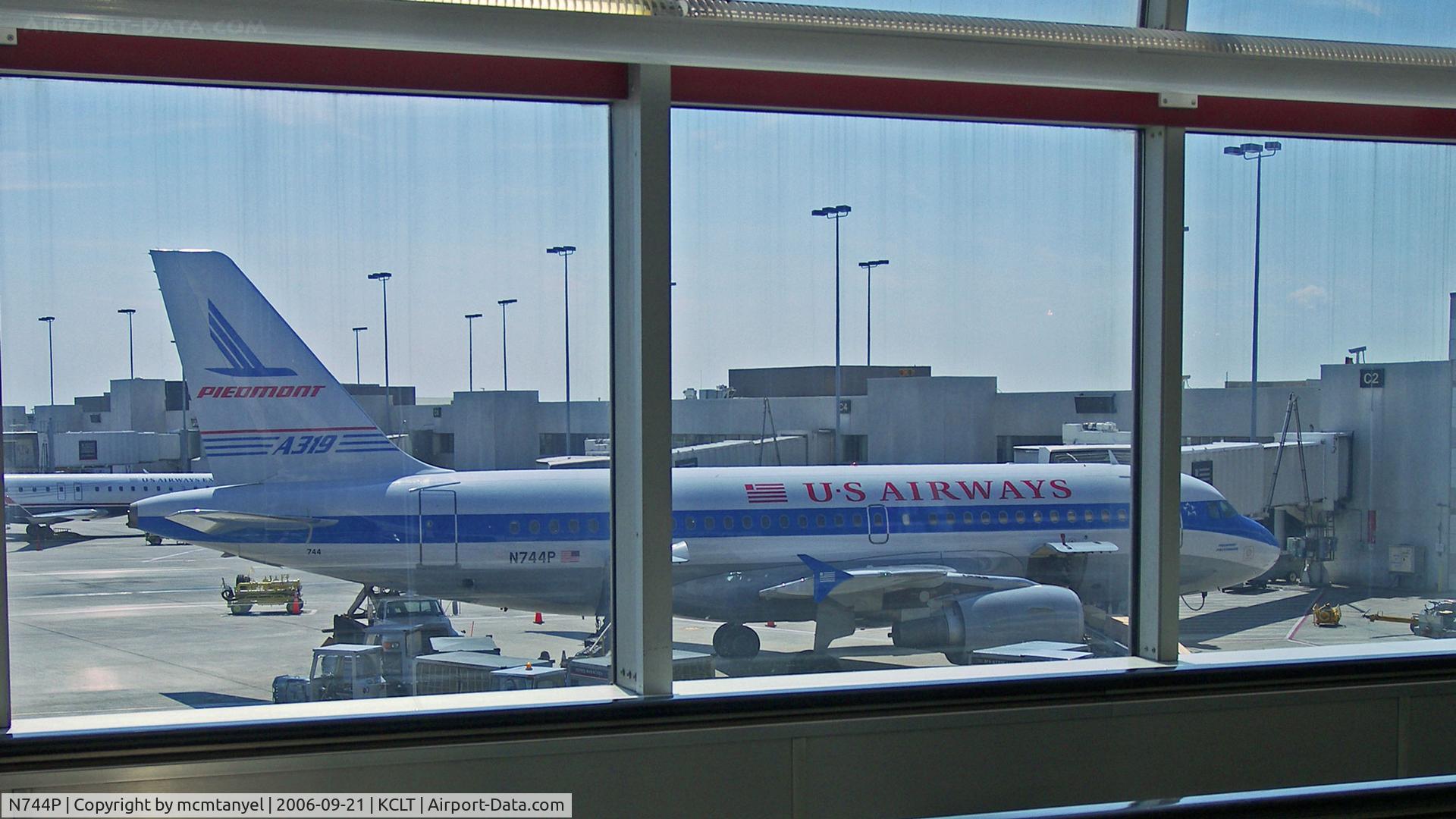 N744P, 2000 Airbus A319-112 C/N 1287, A U S Airways Airbus A319 at the jetway as I transfer in Charlotte