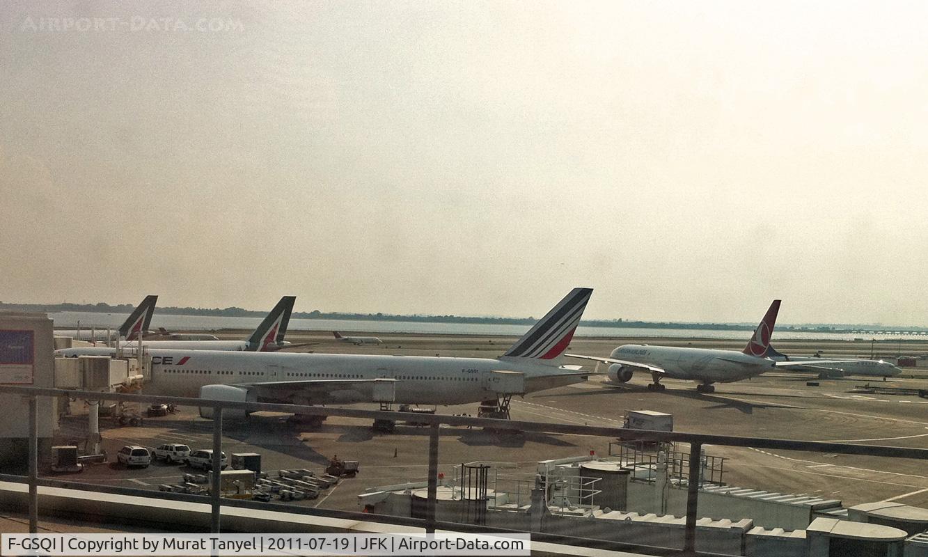 F-GSQI, 2005 Boeing 777-328/ER C/N 32725, Parked at JFK, as a Turkish Airlines B777 taxies to take off.