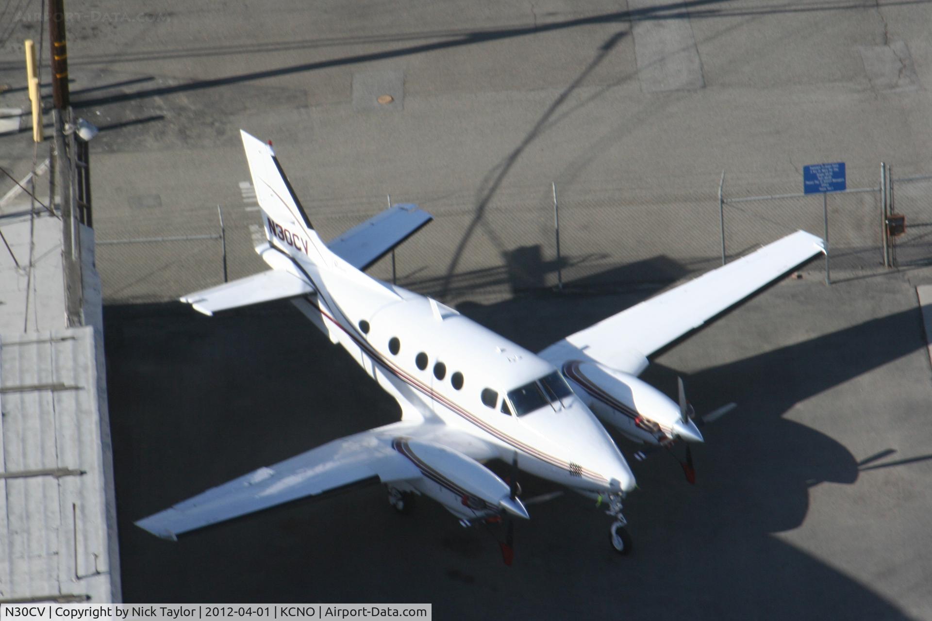 N30CV, 1977 Beech E-90 King Air C/N LW-252, Parked on the north side